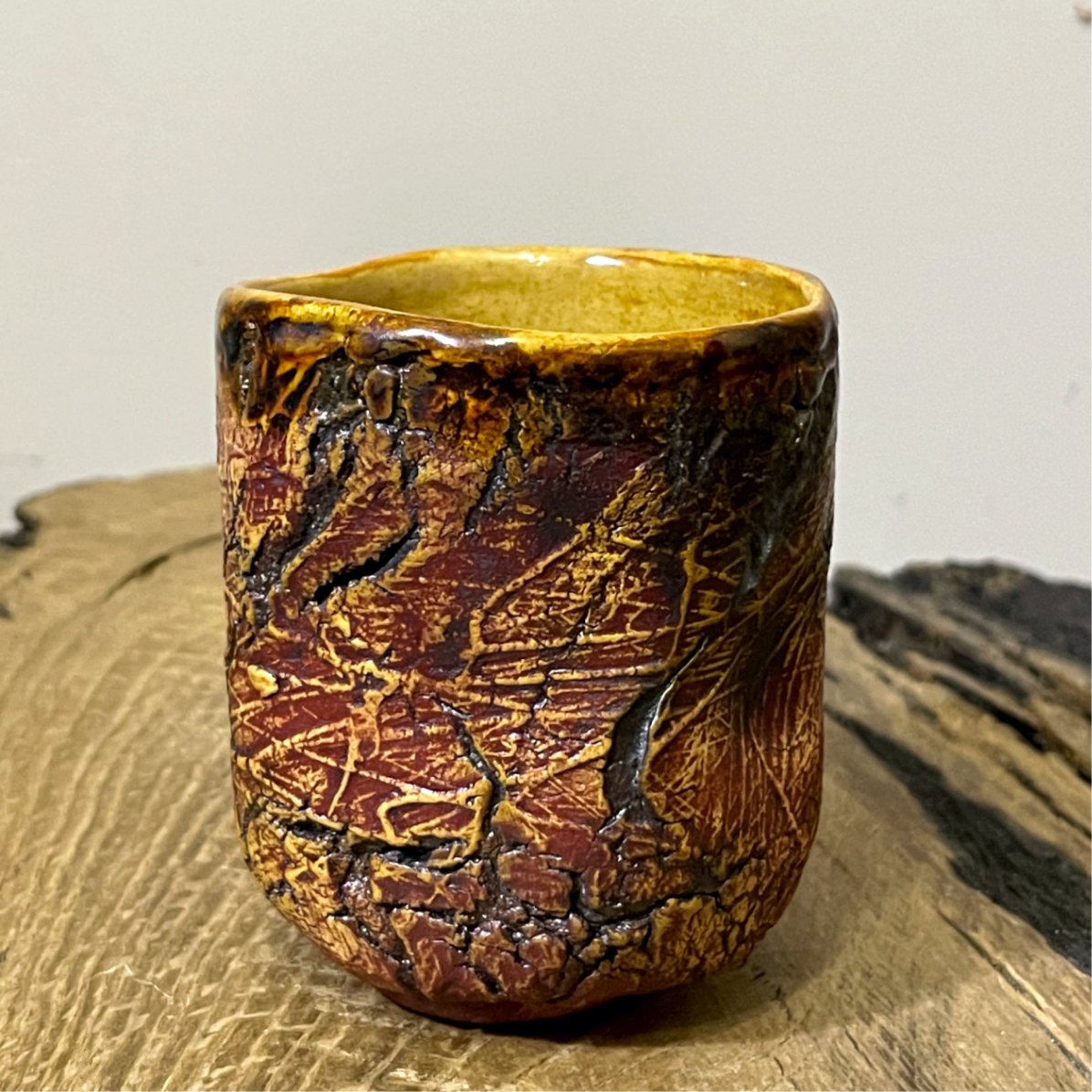 textured ceramic yunomi cup earthy surface detail