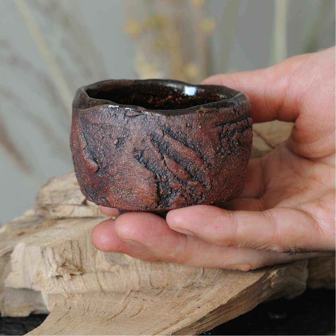 Handmade ceramic tea cup kurinuki technique