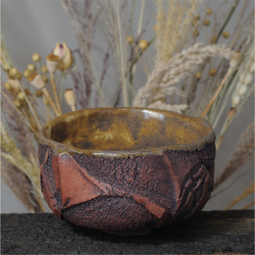 Interior of handmade ceramic bowl with food-safe glazed surface