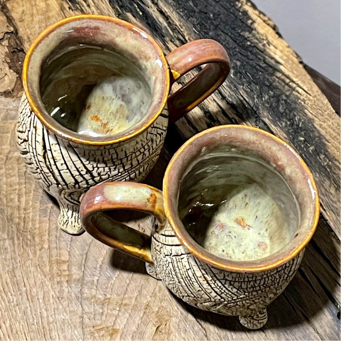 textured ceramic footed mug close-up