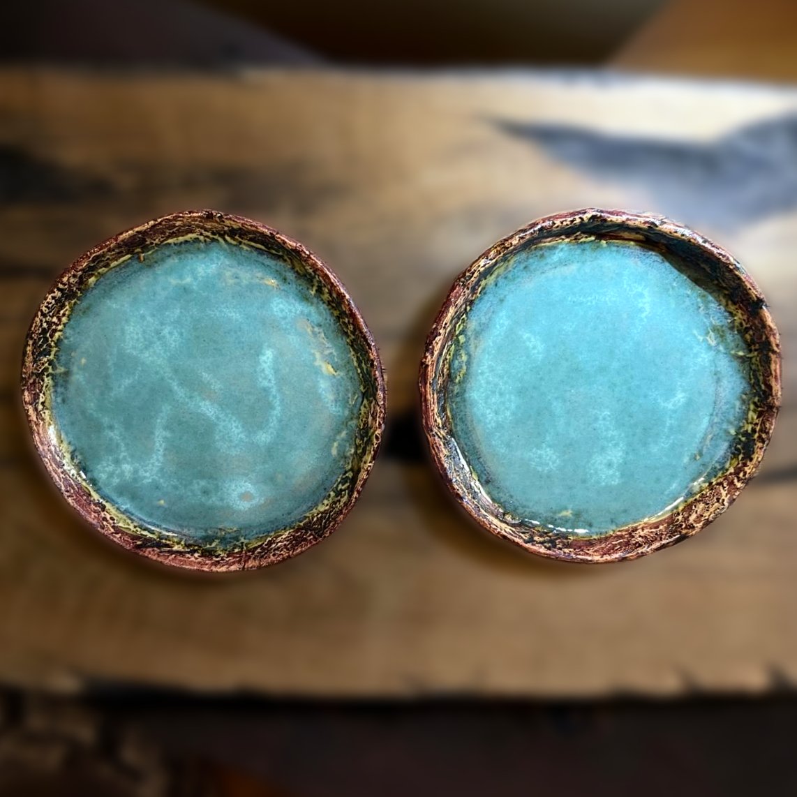 Handmade pottery coffee cup featuring original textured finish