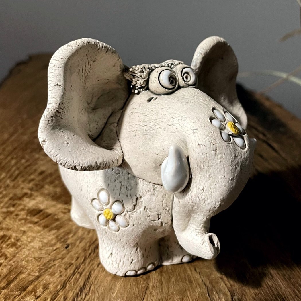 handmade ceramic elephant with flowers