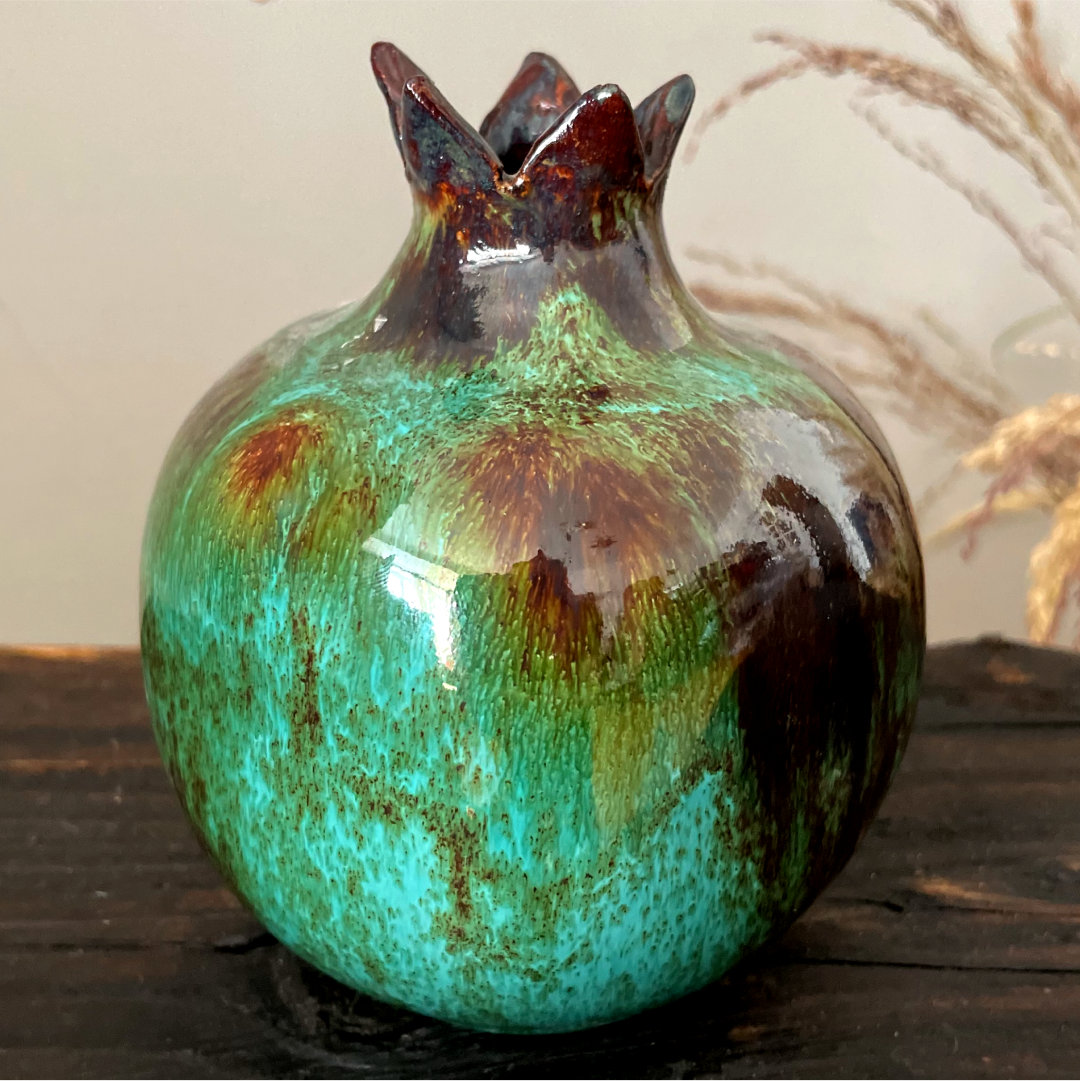 Green glazed ceramic pomegranate vase
