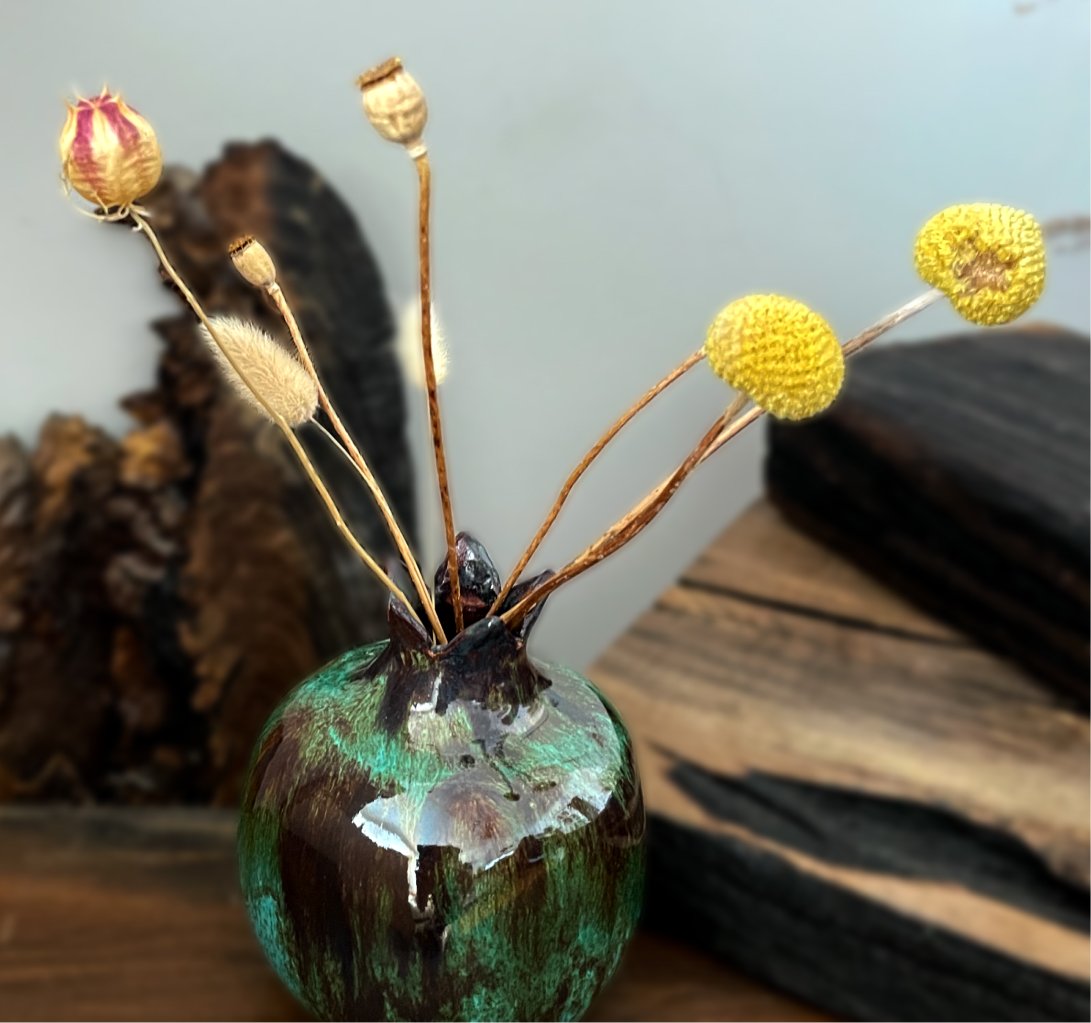 Handmade pottery pomegranate for ikebana