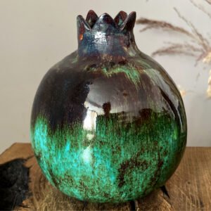 Ceramic pomegranate vase with dark green glaze