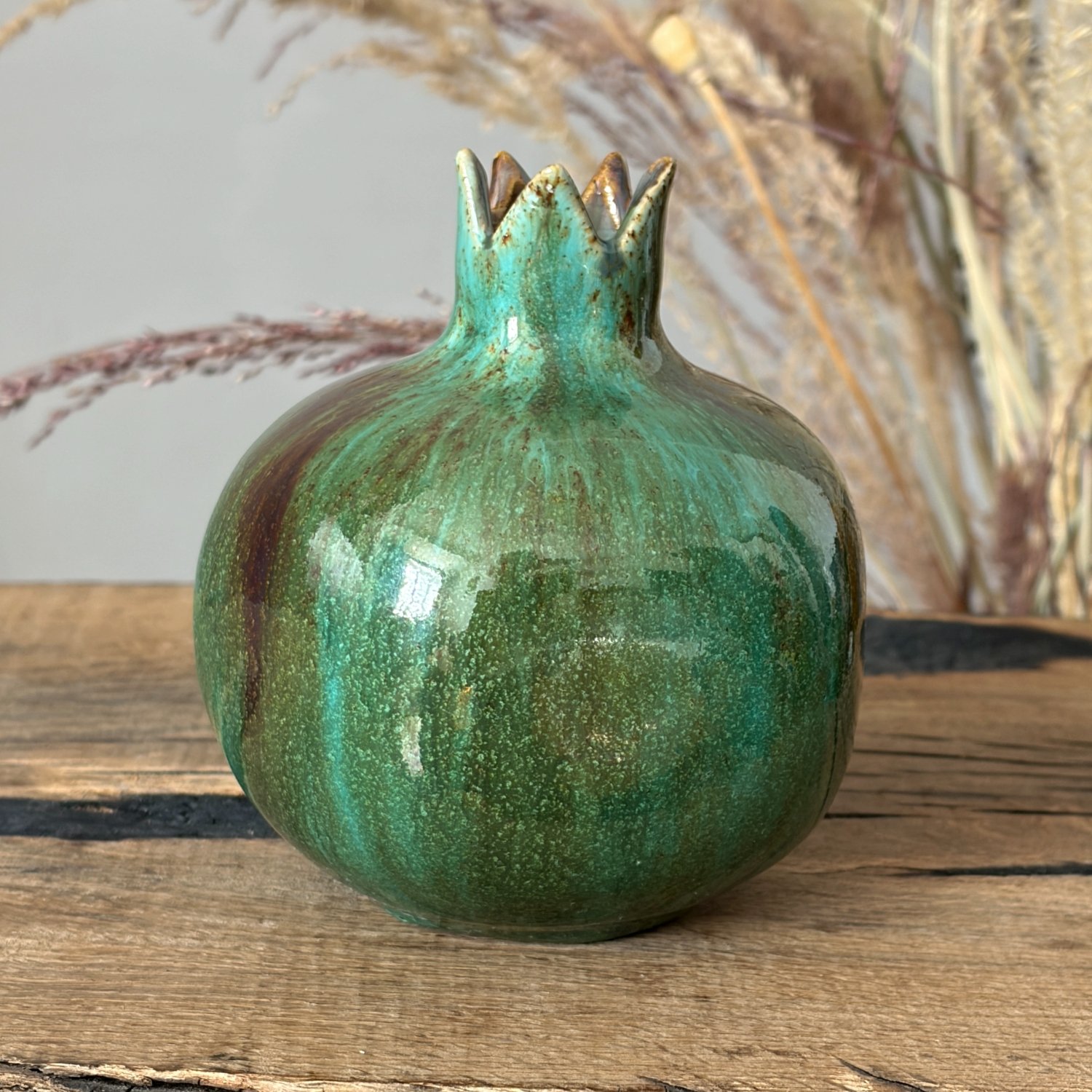 Sculptural green ceramic vase shaped as a pomegranate