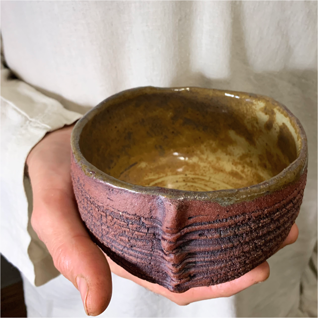 Handmade ceramic matcha bowl in hands, stoneware chawan Dune series