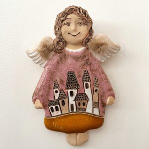 ceramic wall hanging angel with houses front view