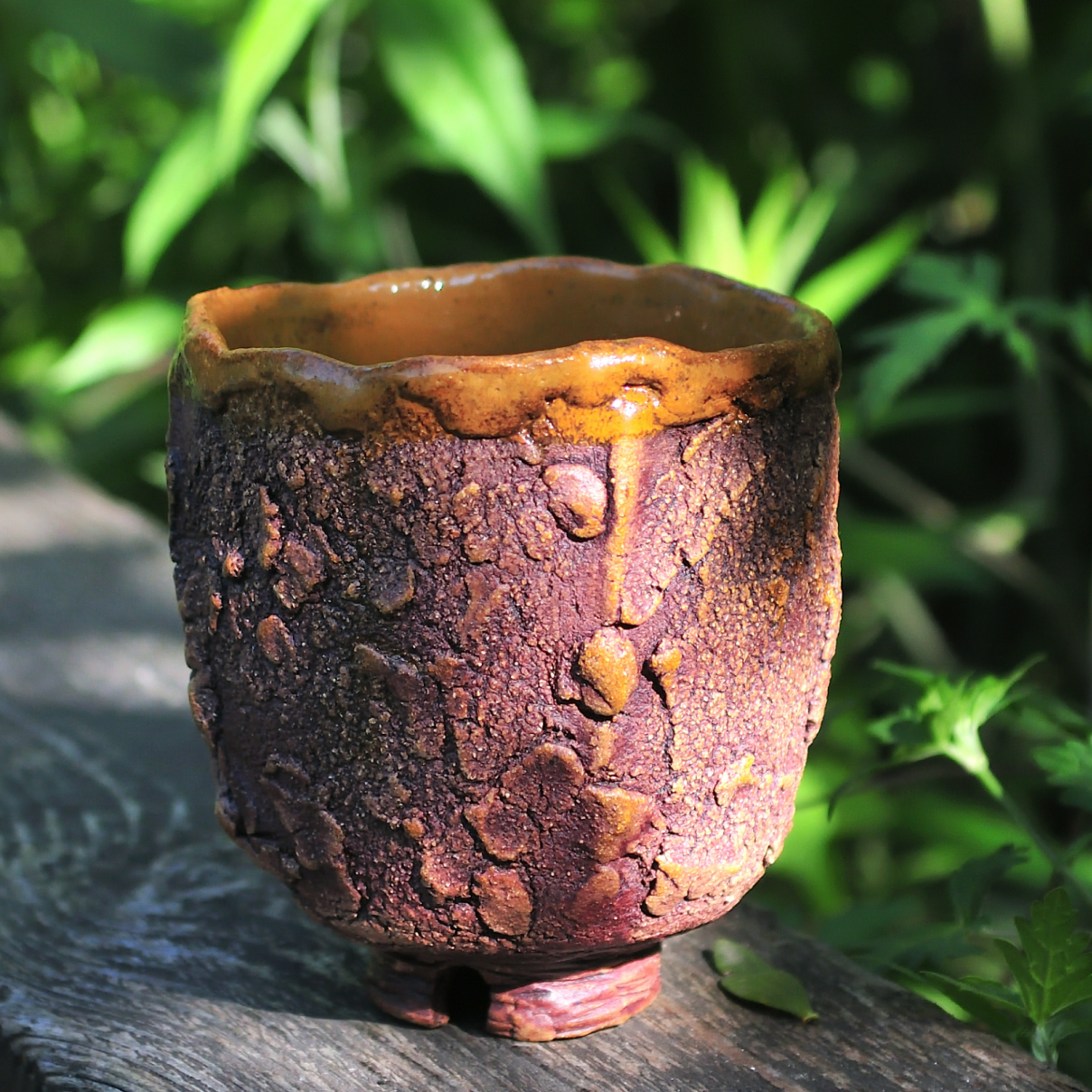 Handleless ceramic tea tumbler with raw carved texture, kurinuki technique