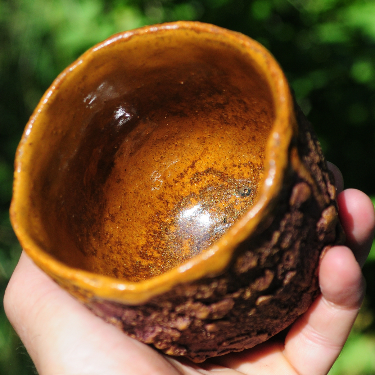 Ceramic tea tumbler carved from a single block of clay, kurinuki style