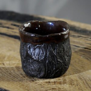 Handmade sculptural yunomi cup with textured surface