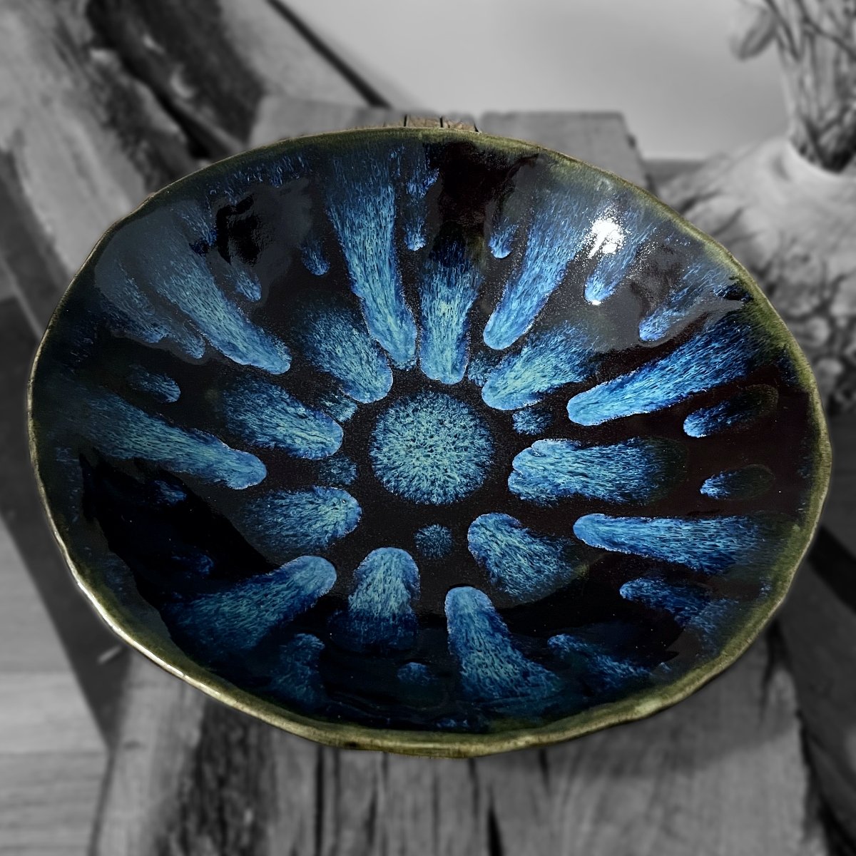 ceramic serving plate with blue crystalline glaze pattern