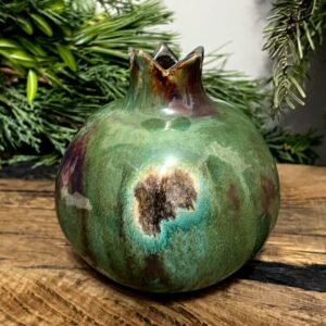 Handmade ceramic pomegranate vase with green glazed surface