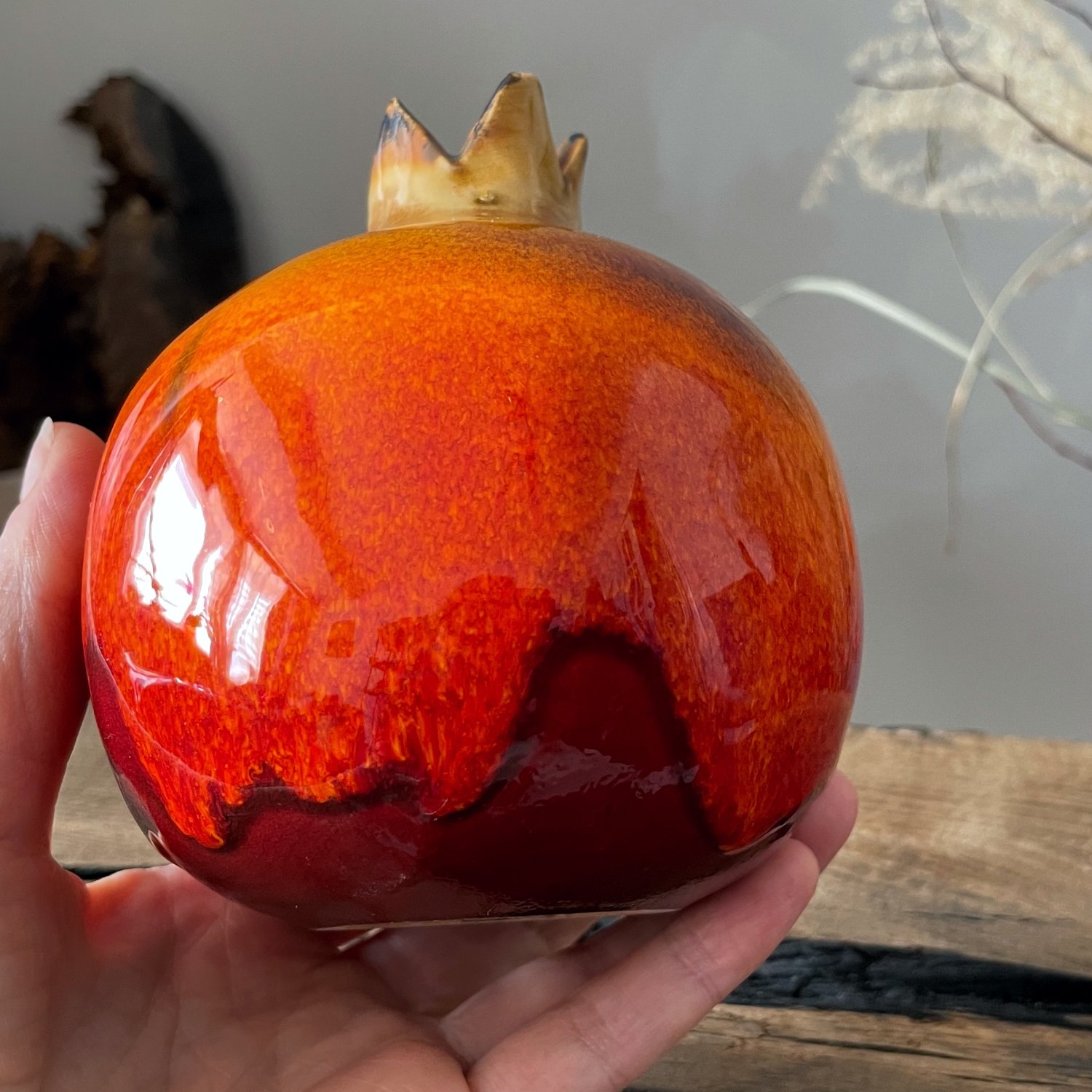 Handmade pottery pomegranate figurine with crown detail